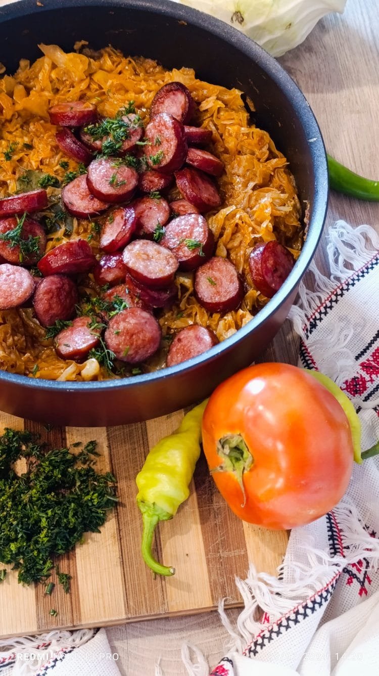Sautéed fresh cabbage with smoked sausage and tomato sauce