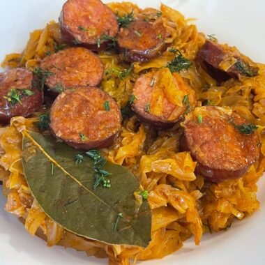 Sautéed fresh cabbage with smoked sausage and tomato sauce
