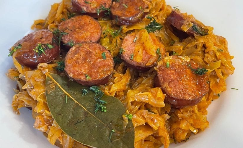 Sautéed fresh cabbage with smoked sausage and tomato sauce