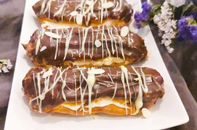Eclairs with vanilla cream and coconut