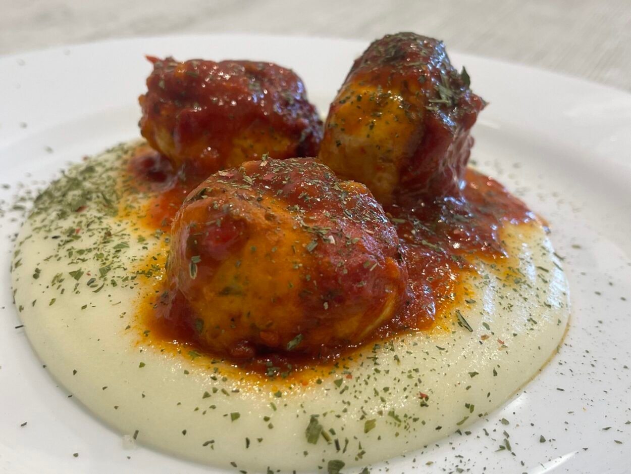 Delicious chicken meatballs with parmesan and tomato sauce