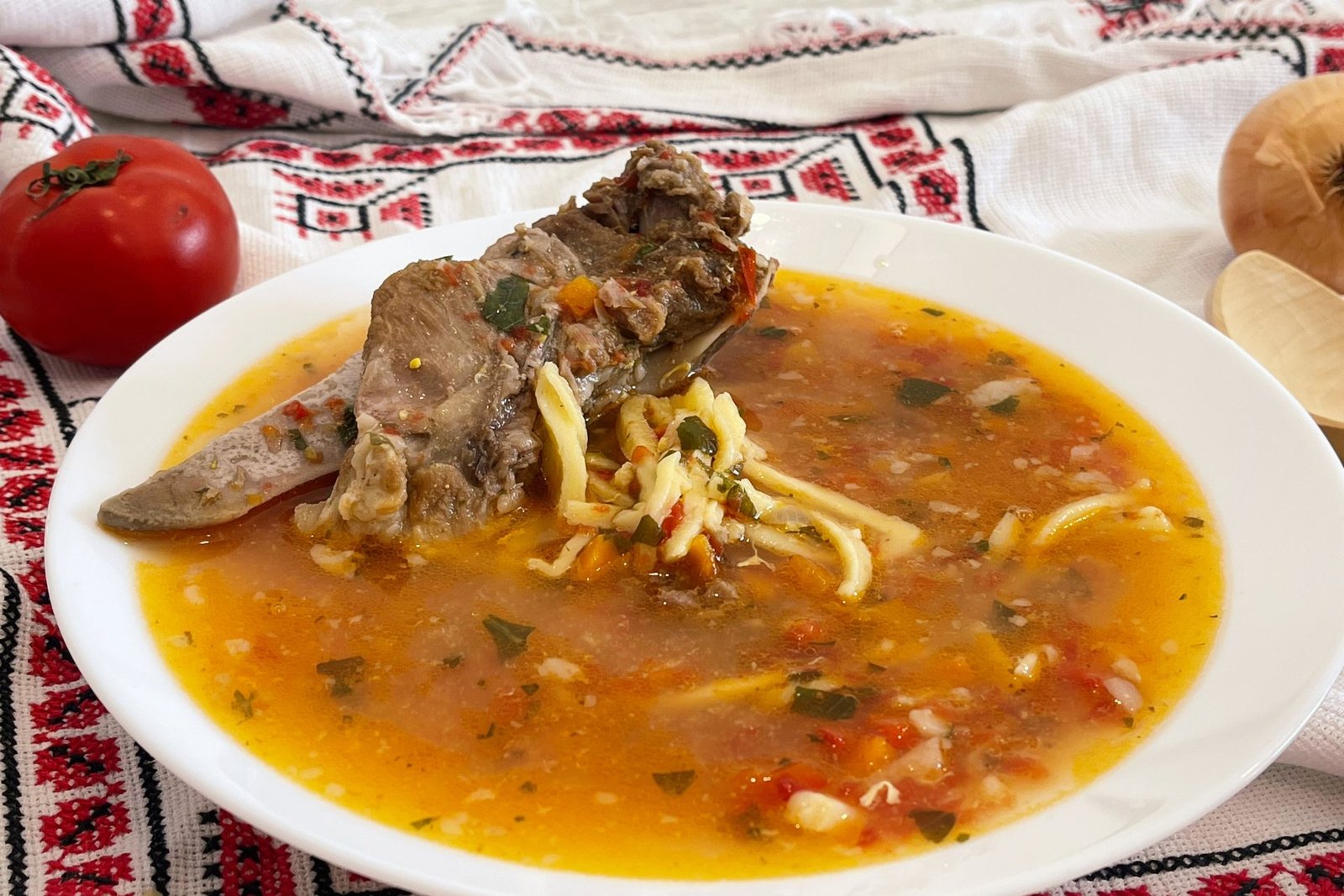 Delicious soup with pork bones and homemade noodles