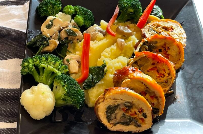 Baked Chicken Breast Roll With Mushrooms And Spinach In Wine Sauce