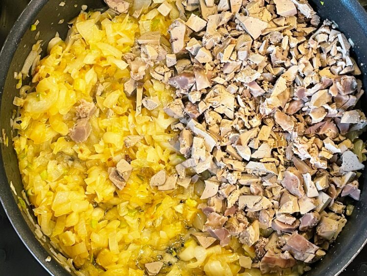 cooked onion and boiled chopped chicken and gizzards for the Romanian Cauldron Stuffing – A Recipe Passed Down from My Grandmother