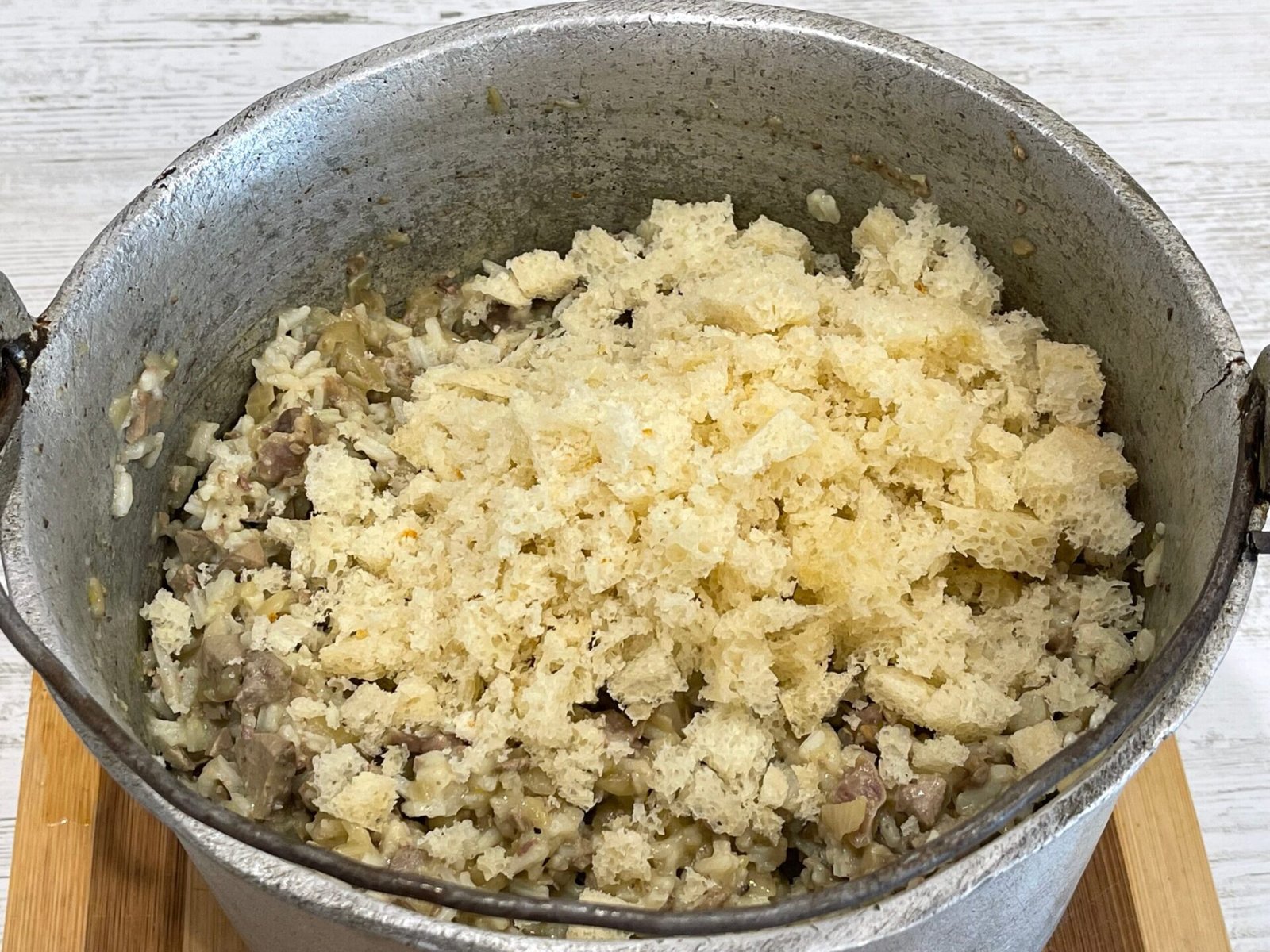 adding bread to the Romanian Cauldron Stuffing – A Recipe Passed Down from My Grandmother