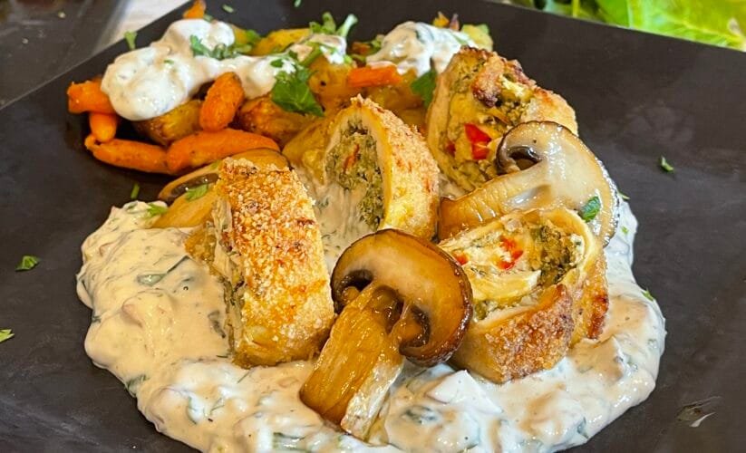 cover photo 1 Chicken Roll recipe with Herbs and Nuts, Served with a Creamy Mushroom and Spinach Sauce Ro: Ruladă Pui cu Verdeturi și Nuci