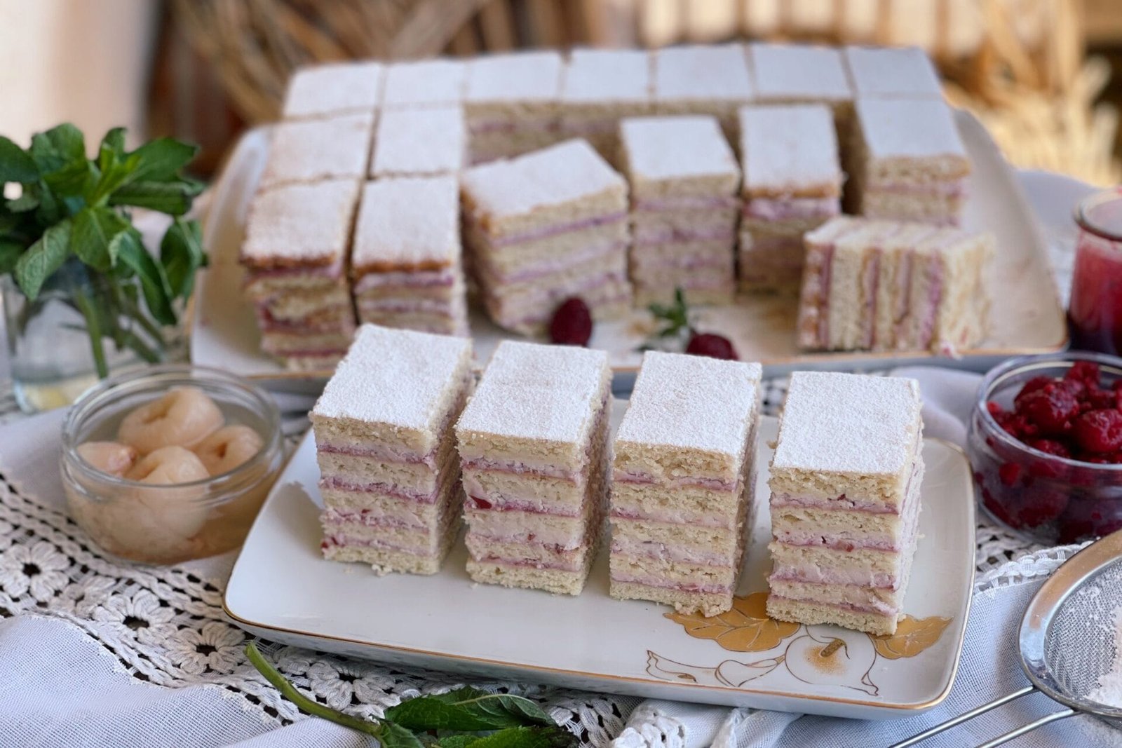 Coconut and Lychee Cream Cake with Raspberry Sauce – inspired by a classic Romanian layered cake