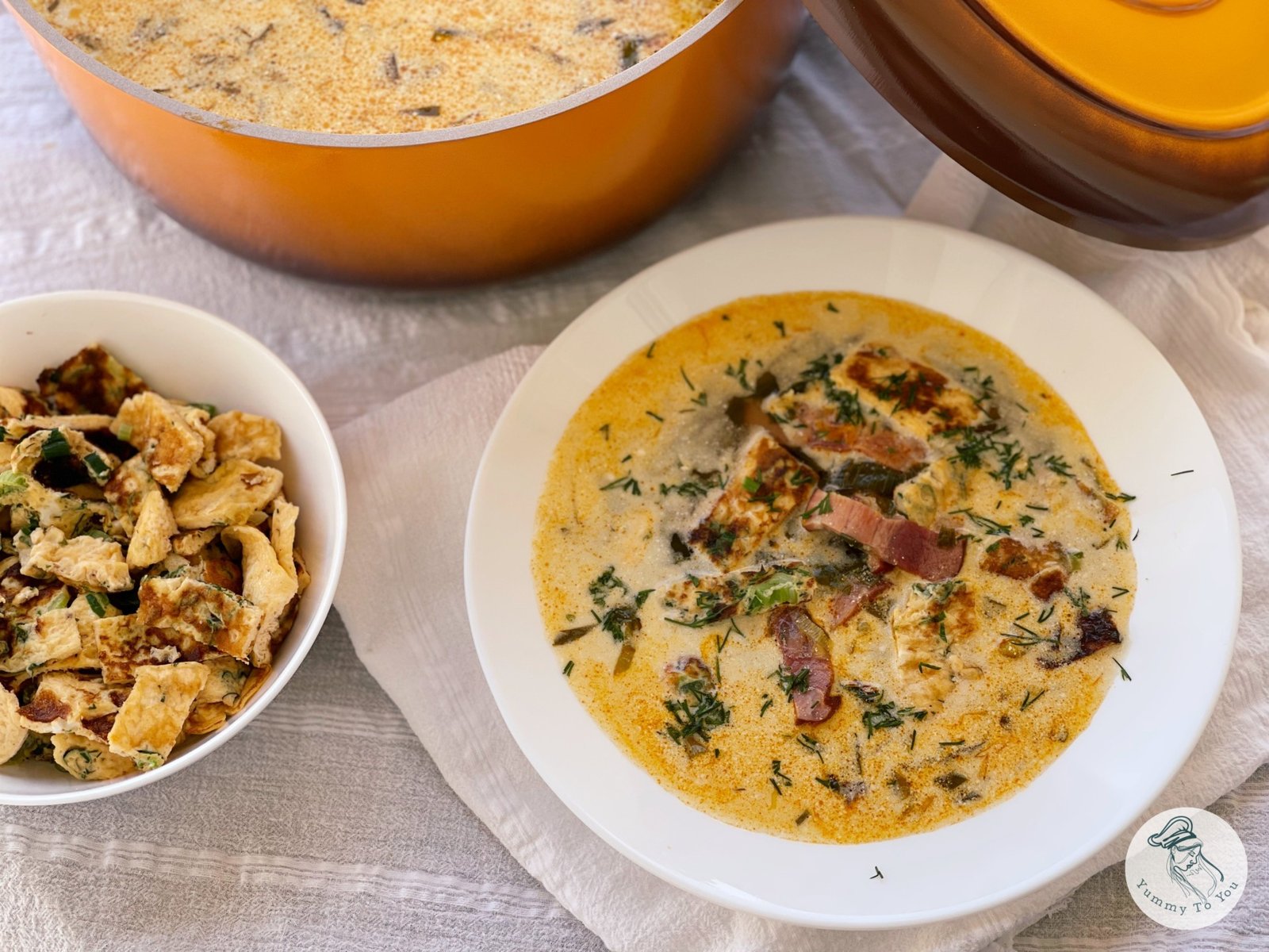 Traditional Romanian lettuce soup with omelette (papara)